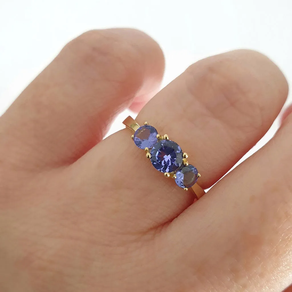 Elegant Trilogy Round Cut Tanzanite Ring