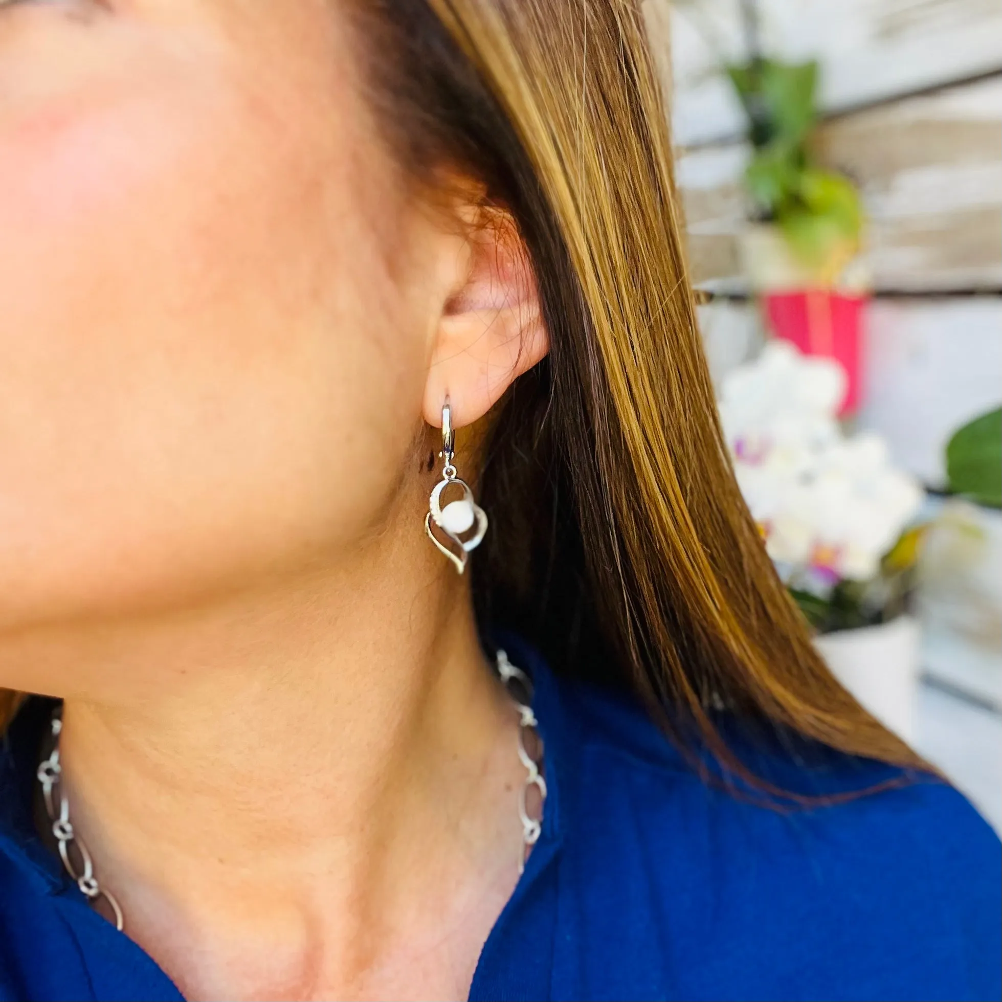 Sideways Dangling Zircon Heart Earrings