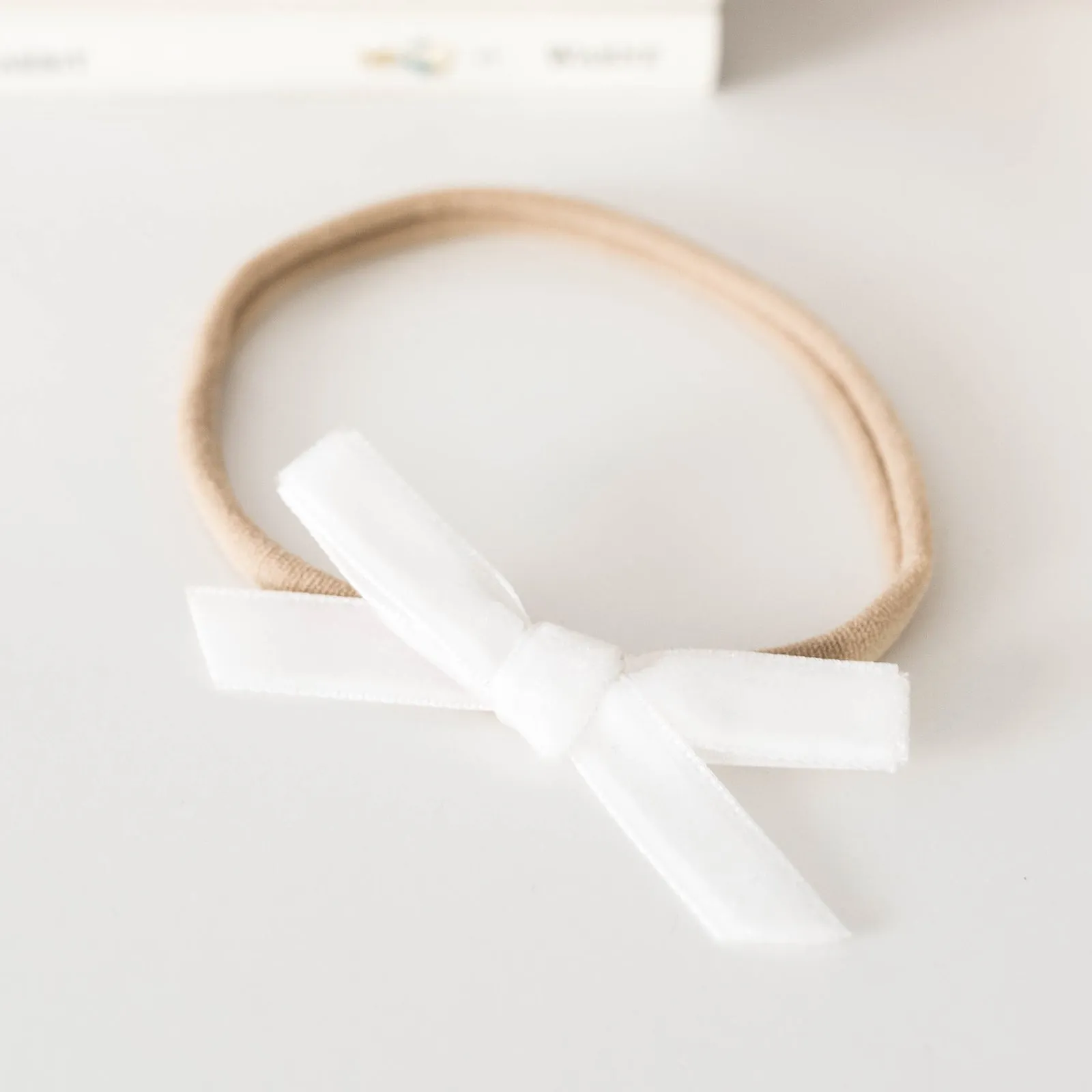 Snuggle Hunny Velvet Bow Stretchy Headband - White