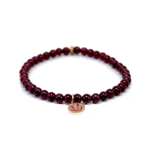 Stretchy Garnet Bracelet  With 14k Smile Charm
