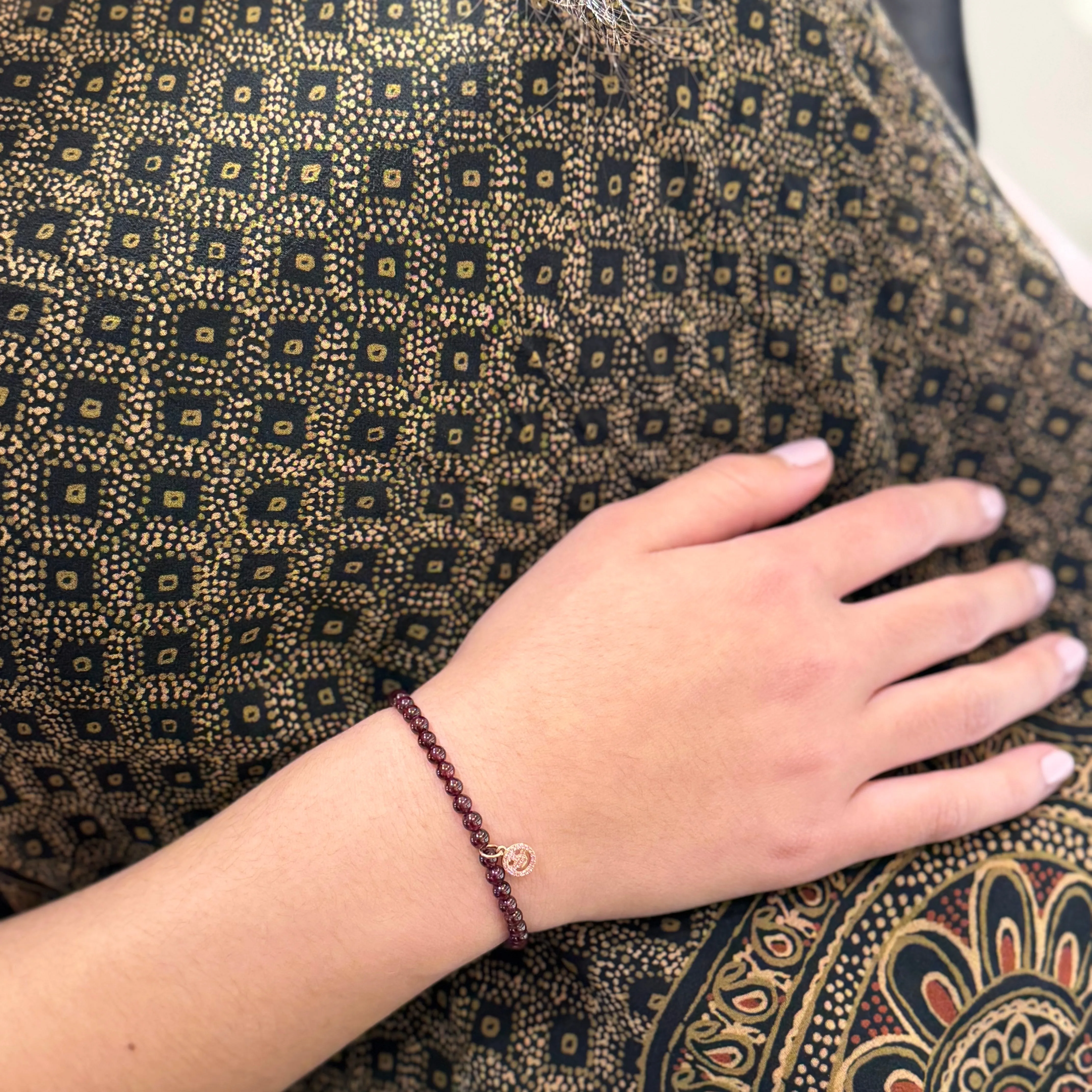 Stretchy Garnet Bracelet  With 14k Smile Charm